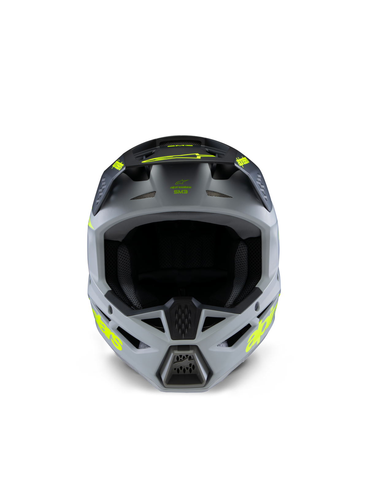 Casque Alpinestars S-M3 Junior Radium, casque de motocross, gris, noir et jaune fluo mat, vue de face présentant une coque angulaire agressive, logos jaunes éclatants sur les côtés et la visière, finition mate conçue pour le tout-terrain et le motocross pour enfant.