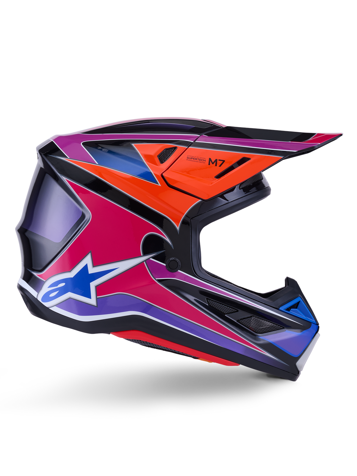 Casque Alpinestars S-M7 Fuse, casque de motocross, bleu, violet et rose brillant, vue de profil avec des graphismes de course éclatants, design de coque aérodynamique avec ports de ventilation et logo étoile Alpinestars