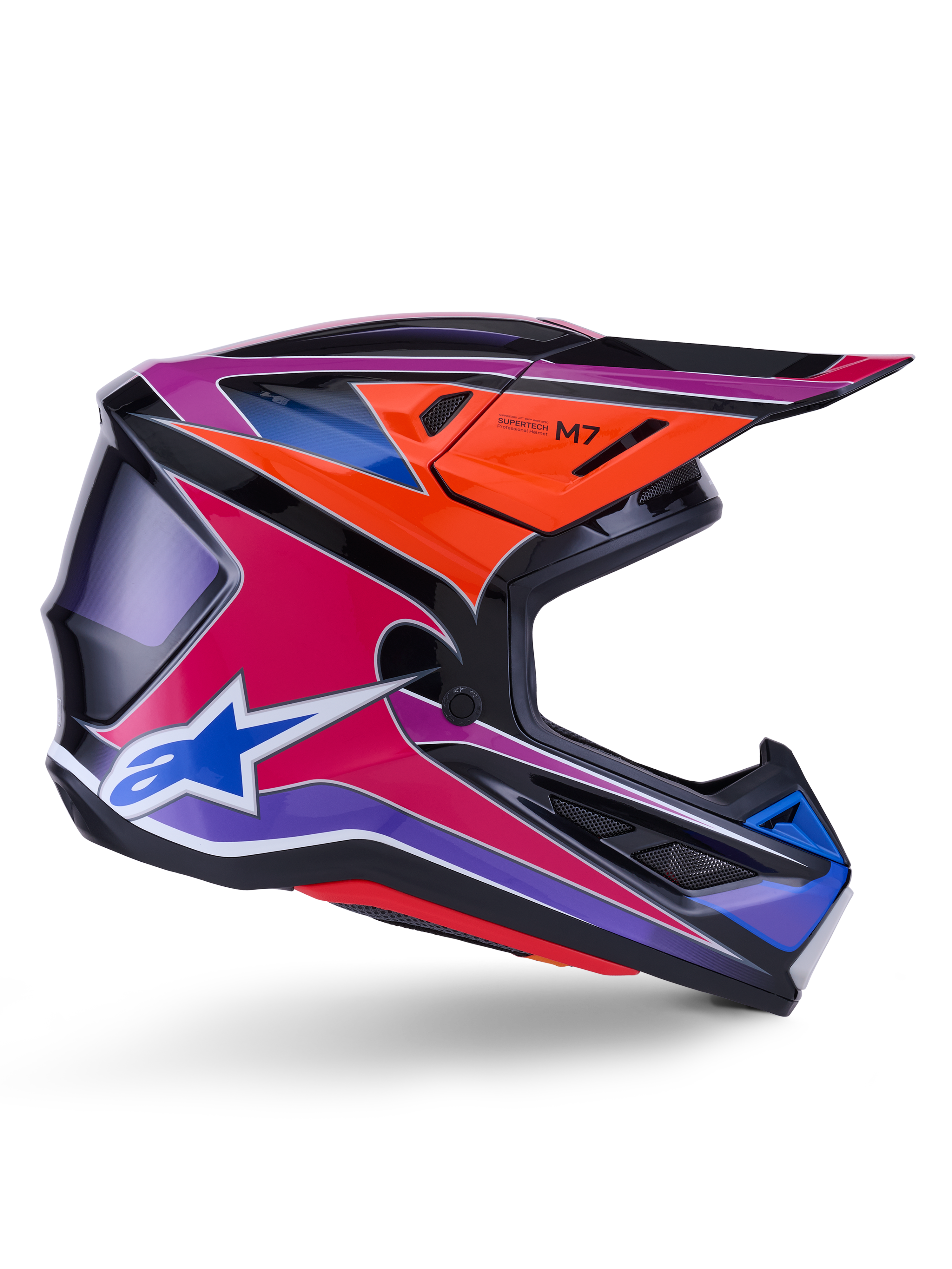 Casque Alpinestars S-M7 Fuse, casque de motocross, bleu, violet et rose brillant, vue de profil avec des graphismes de course éclatants, design de coque aérodynamique avec ports de ventilation et logo étoile Alpinestars