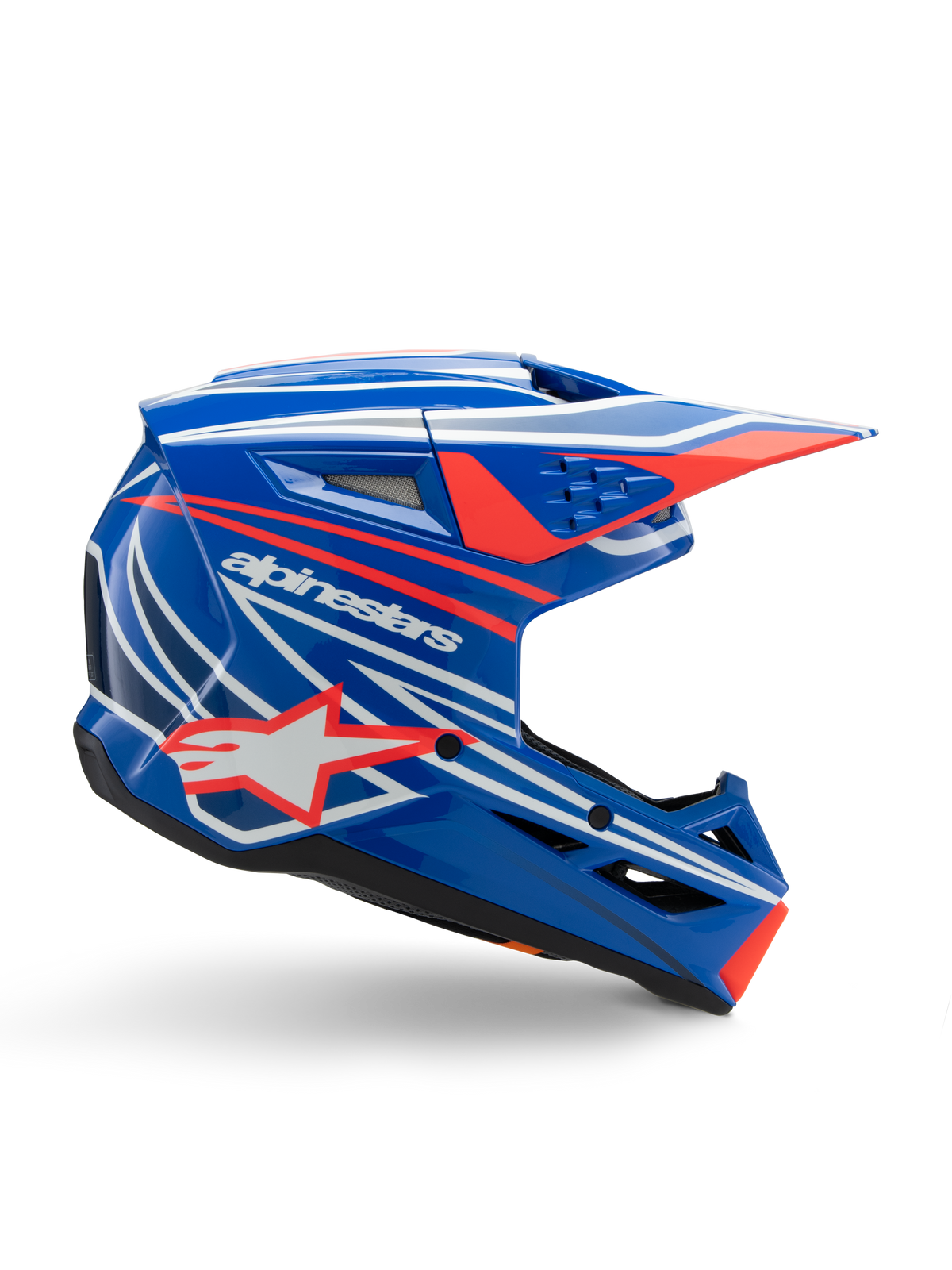 Alpinestars S-M3 Youth Wurx Helmet, casque de motocross pour jeunes, bleu avec motifs rouges et blancs, profil latéral avec visière aérodynamique, fentes de ventilation et logo étoile, finition brillante, certifié ECE 22.06