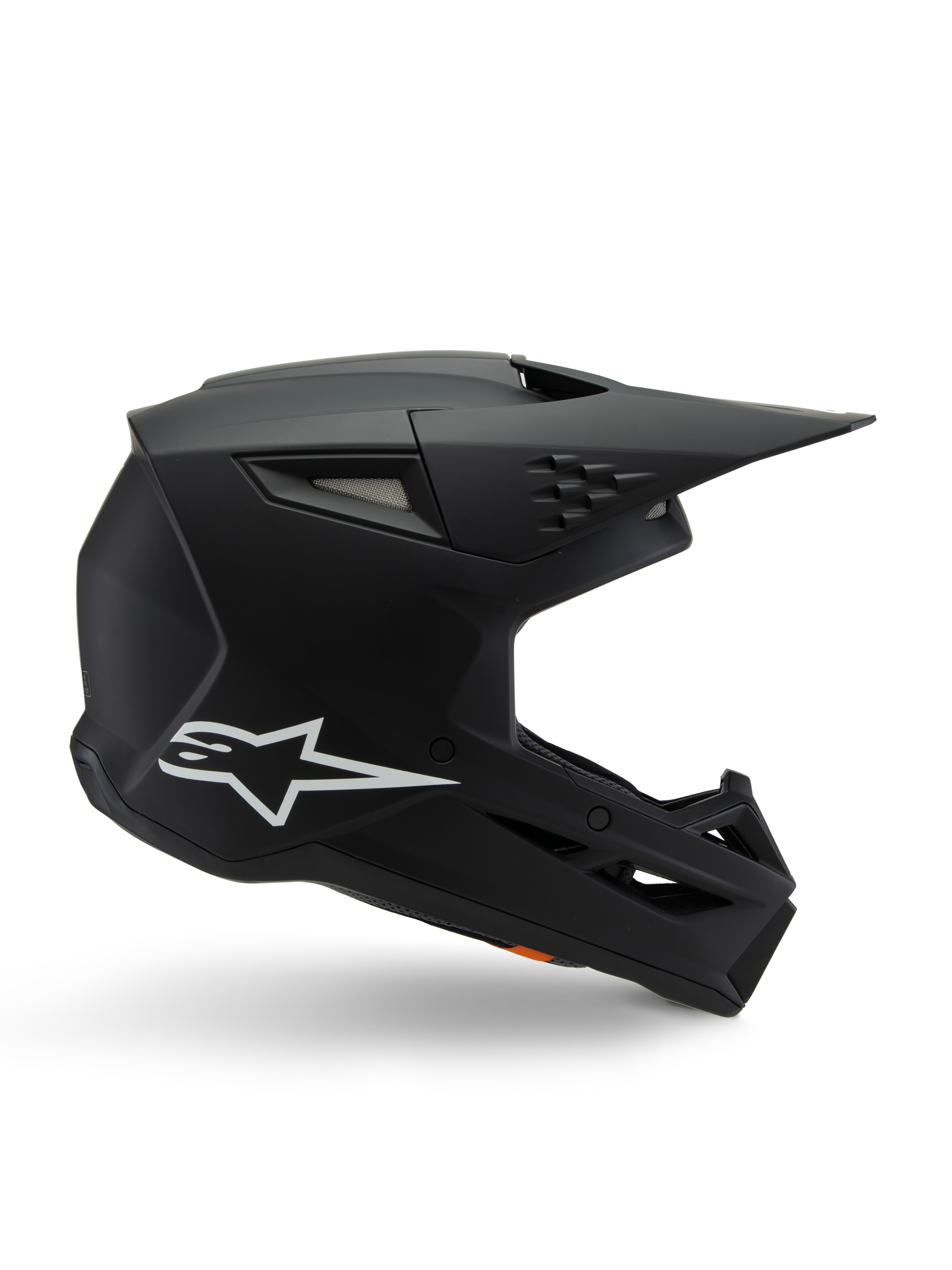 Casque Alpinestars S-M3 Youth Solid, casque de motocross, noir mat avec logo étoile blanc, vue de profil présentant un design angulaire, une longue visière et des aérations intégrées, certifié ECE 22.06