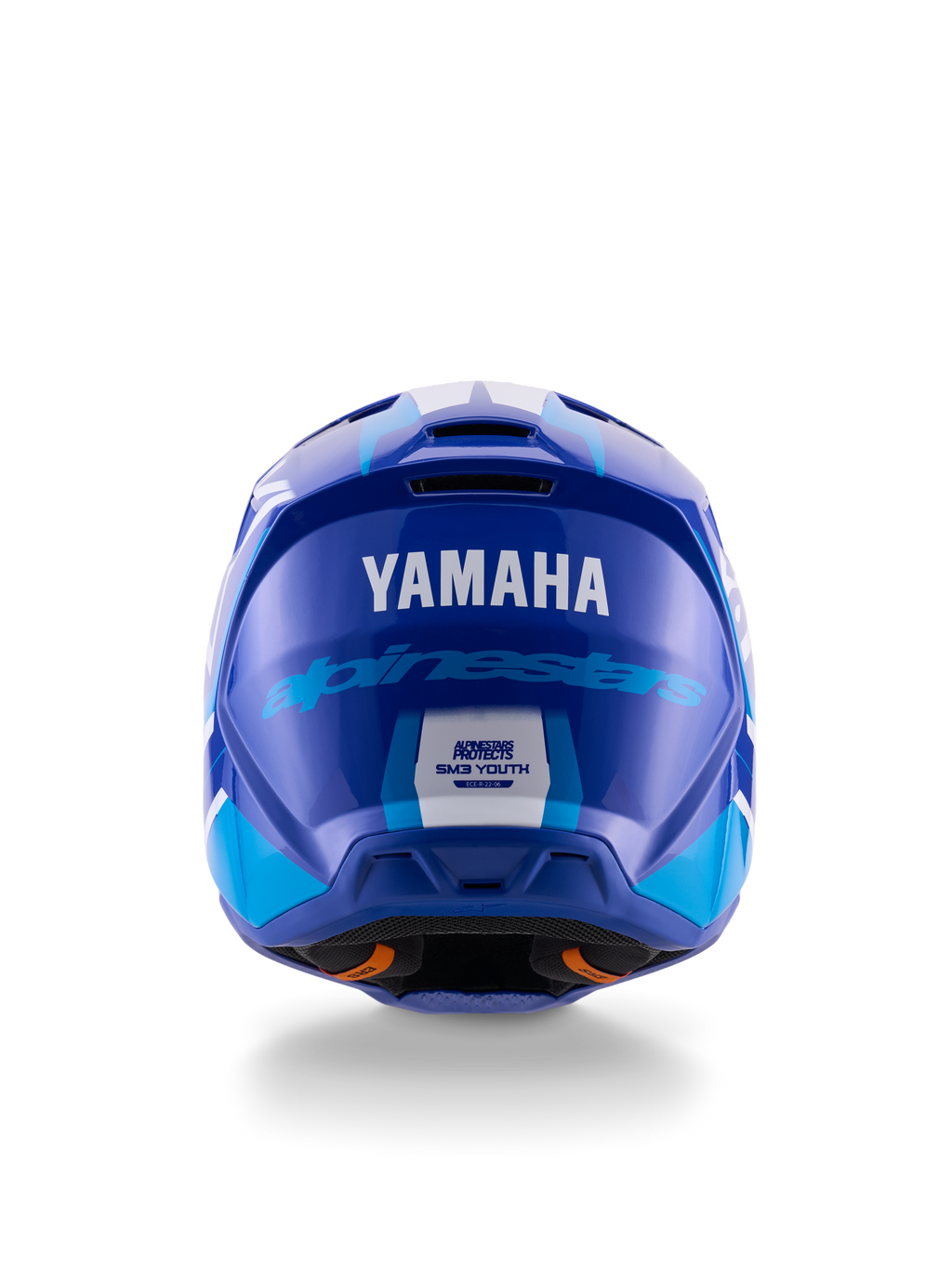 Yamaha S-M3 Youth Motocross Helmet, Rear view, Blue and White Glossy, featuring prominent Yamaha and Alpinestars branding, aerodynamic shell design with ECE 22.06 safety certification label, professional head protection for off-road racing