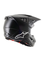 Alpinestars S-M5 Solid Helmet ECE 22.06, Matte Black Motocross Helmet, side-rear profile view featuring a white Alpinestars logo, multiple ventilation ports, and integrated visor for off-road riding protection
