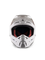 Casque Alpinestars S-M5 Solid ECE 22.06, casque de motocross, blanc brillant, vue de face, doté de multiples entrées d'air sur la mentonnière et le front, large visière, doublure intérieure rouge et noire, design profilé et aérodynamique pour la course tout-terrain
