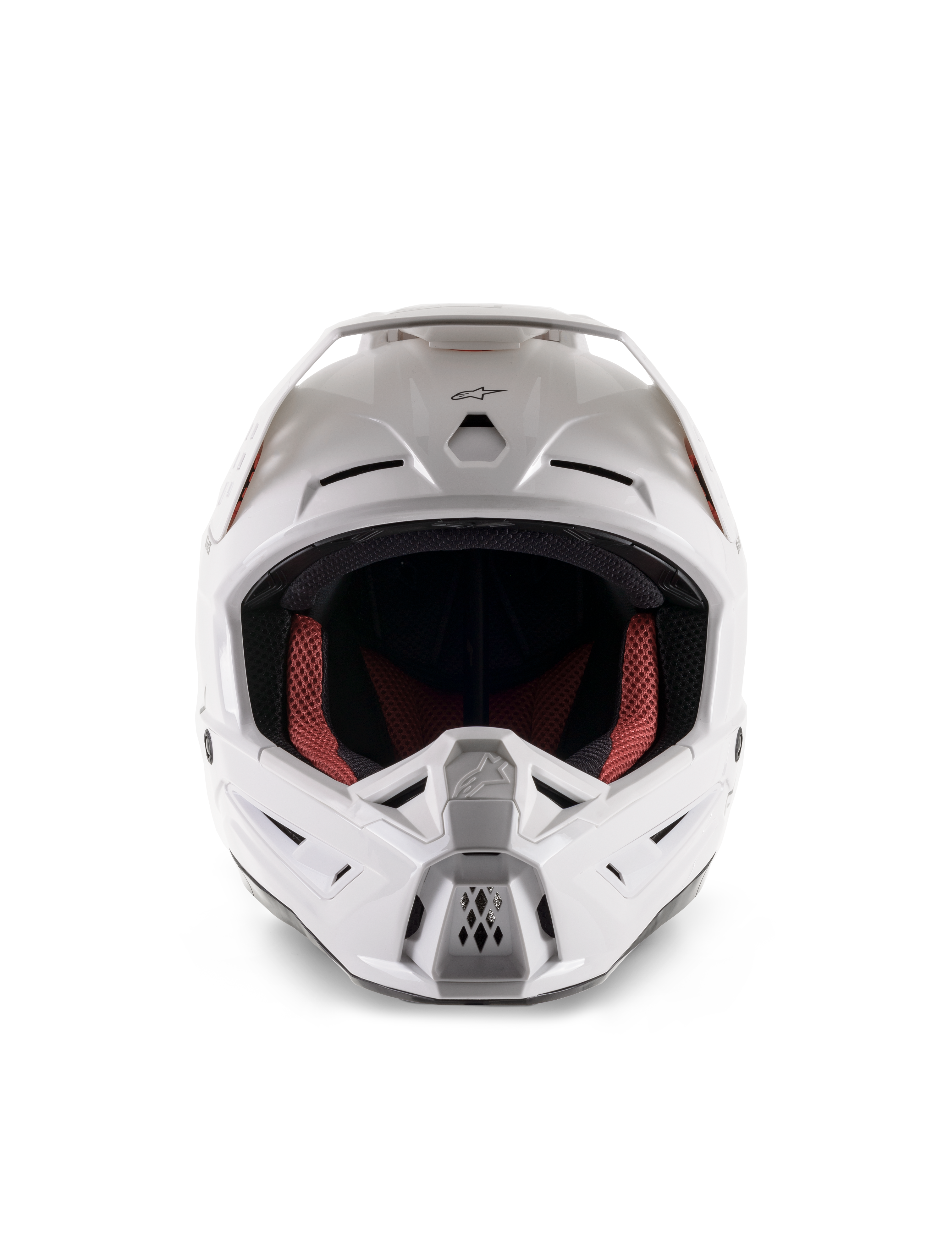Casque Alpinestars S-M5 Solid ECE 22.06, casque de motocross, blanc brillant, vue de face, doté de multiples entrées d'air sur la mentonnière et le front, large visière, doublure intérieure rouge et noire, design profilé et aérodynamique pour la course tout-terrain