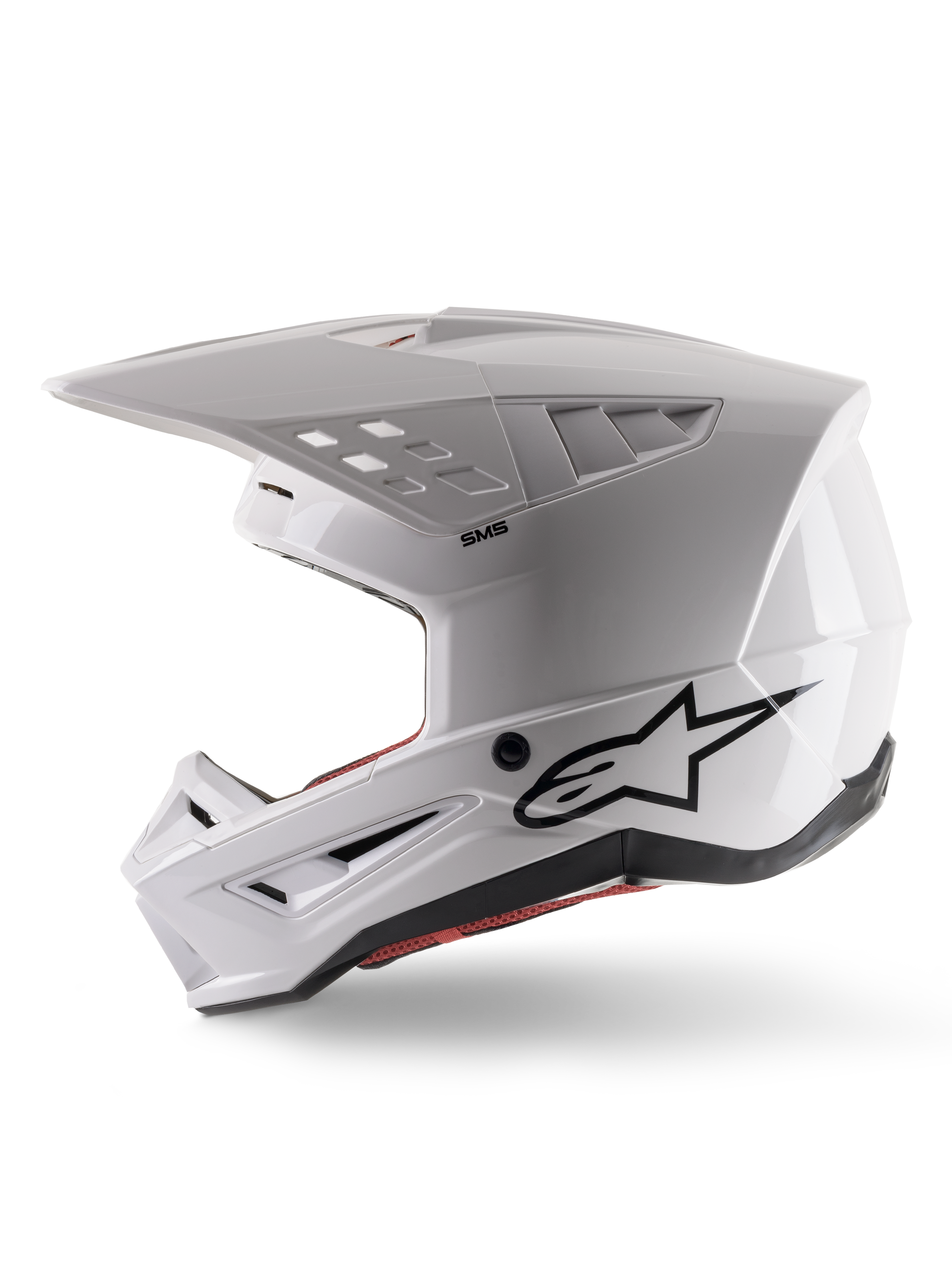 Alpinestars S-M5 Solid Helmet ECE 22.06, casque de motocross, blanc brillant, vue de profil avec design de coque angulaire, logo Alpinestars noir sur le côté, multiples orifices de ventilation et visière intégrée pour la course tout-terrain.