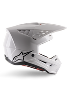 Alpinestars S-M5 Solid Helmet ECE 22.06, casque de motocross, blanc brillant, profil latéral présentant un design aérodynamique angulaire, visière proéminente, aérations intégrées, logo Astars noir à l'arrière et rembourrage intérieur rouge visible