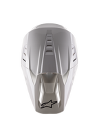 Alpinestars S-M5 Solid Helmet ECE 22.06, casque de motocross, blanc brillant, vue de dessus montrant les aérations supérieures et le logo noir sur l'extrémité de la visière