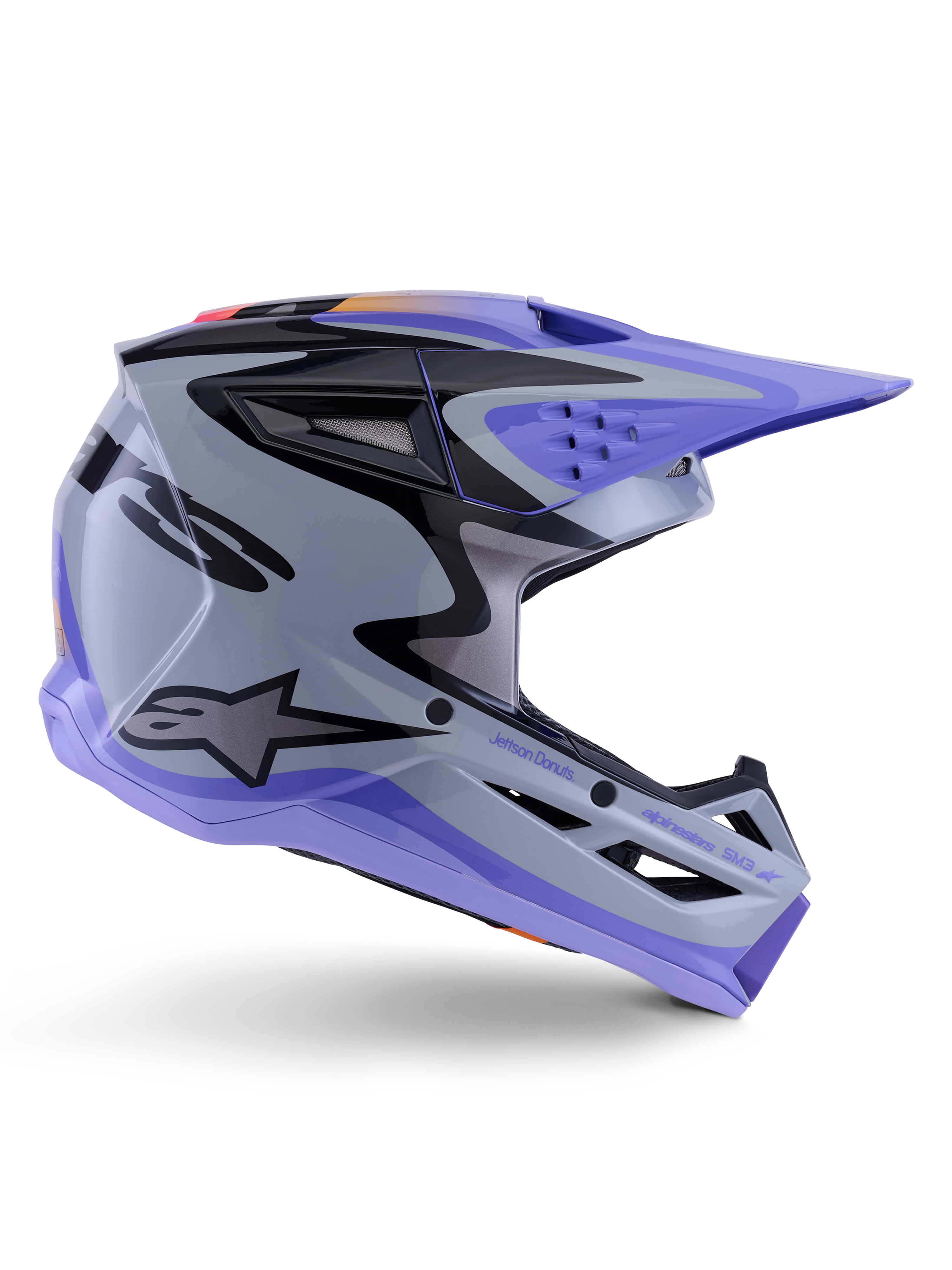 Alpinestars S-M3 Jettson Helmet ECE 22.06, Motocross Helmet, Gray Purple and Black Glossy, side profile view featuring a purple visor and chin guard, sleek aerodynamic shell with black graphics, multiple ventilation ports, and "Jettson Donuts" branding on the side.