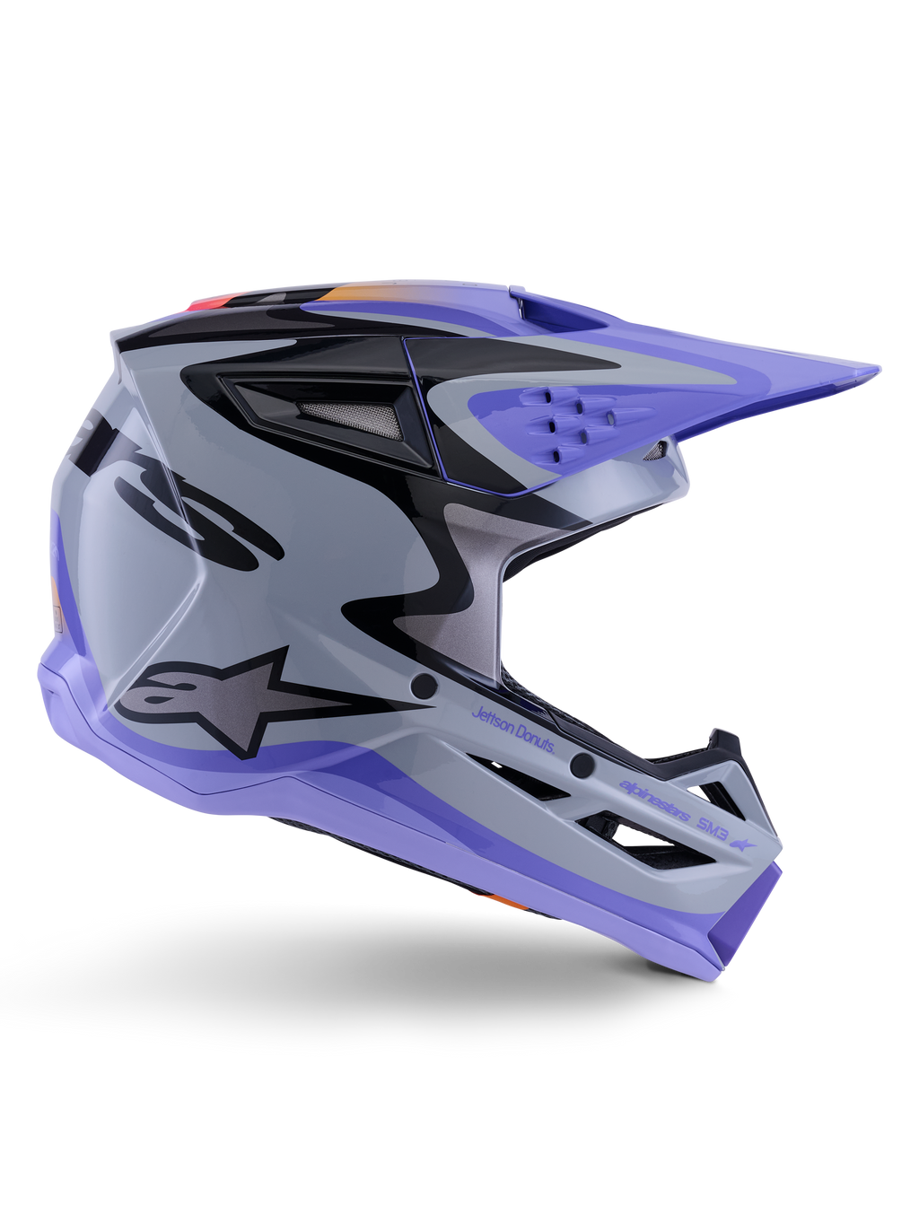 Alpinestars S-M3 Jettson Youth Helmet, Motocross Helmet, Gray Purple and Black Glossy, side profile featuring sharp angular graphics and 'Jettson Donuts' branding, aerodynamic shell design with ventilation ports and Alpinestars logo, high-performance youth off-road protective gear