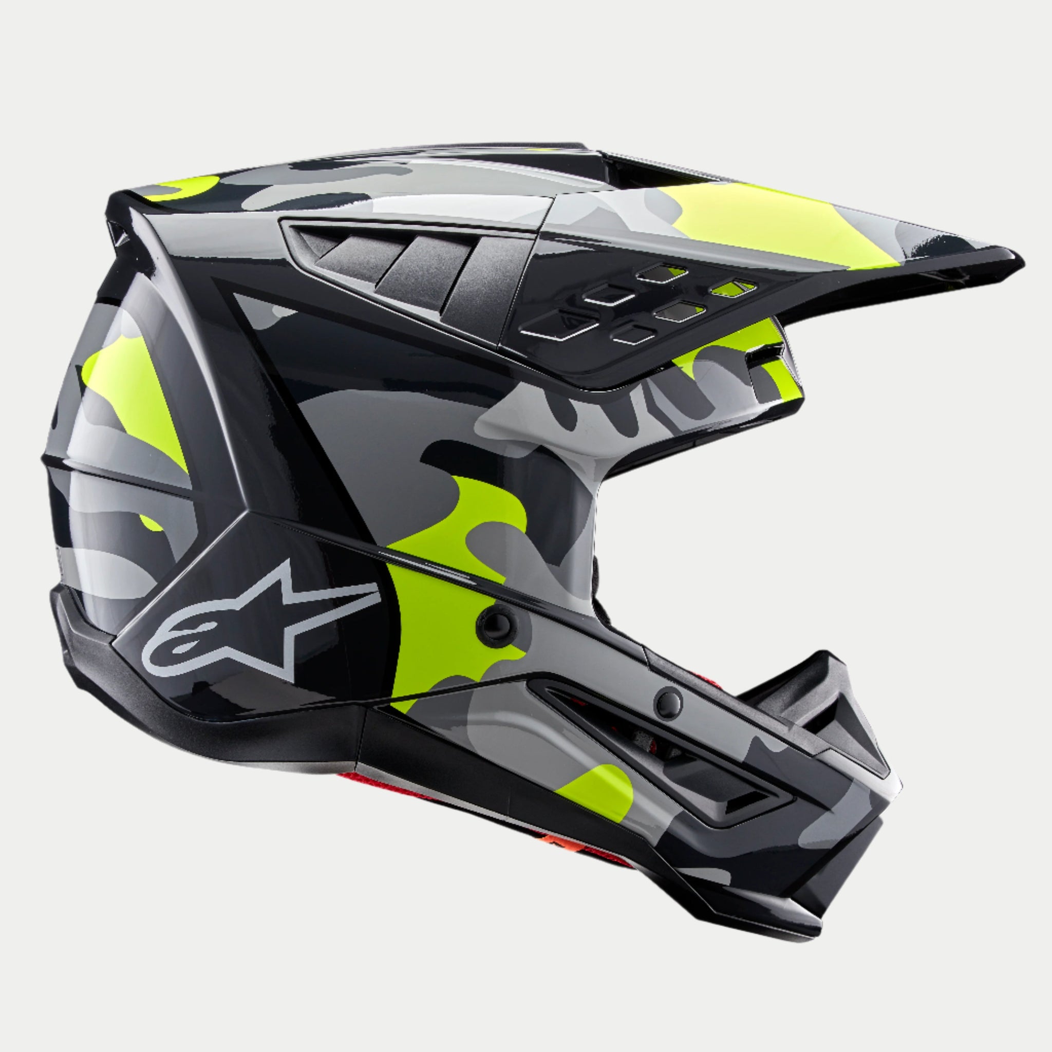Casque Alpinestars S-M5 Rover 2, casque de motocross, gris foncé et jaune fluo brillant, avec un motif graphique camouflage, vue de profil avec logo Astars blanc et ports de ventilation avancés