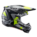 Casque Alpinestars S-M5 Rover 2 ECE, casque de motocross, gris foncé et jaune fluo brillant, motif camouflage, vue de profil avec logo latéral blanc, visière aérodynamique et ports de ventilation agressifs