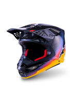 Alpinestars Limited Edition Supertech M10 Black Hole Helmet, Motocross Helmet, Black Burst Glossy with vibrant yellow, orange, and blue splatter pattern, visible carbon fiber on visor, red interior padding, bold Alpinestars branding, professional off-road safety equipment