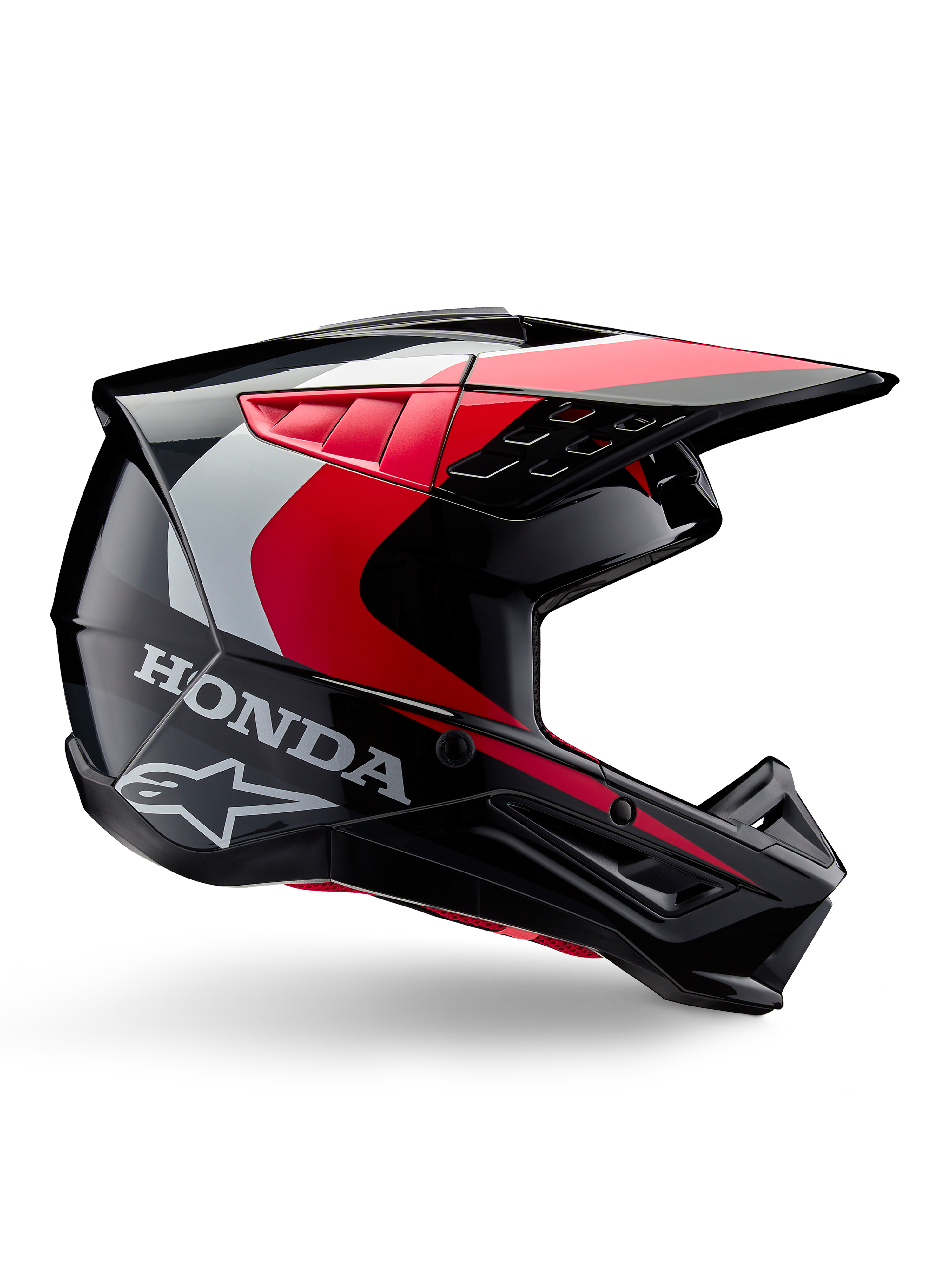 Honda S-M5 Helmet, Motocross Helmet, Black Red Glossy with white and silver accents, side view featuring Honda and Alpinestars logos, aerodynamic design with visor and multiple ventilation ports, professional off-road protective gear