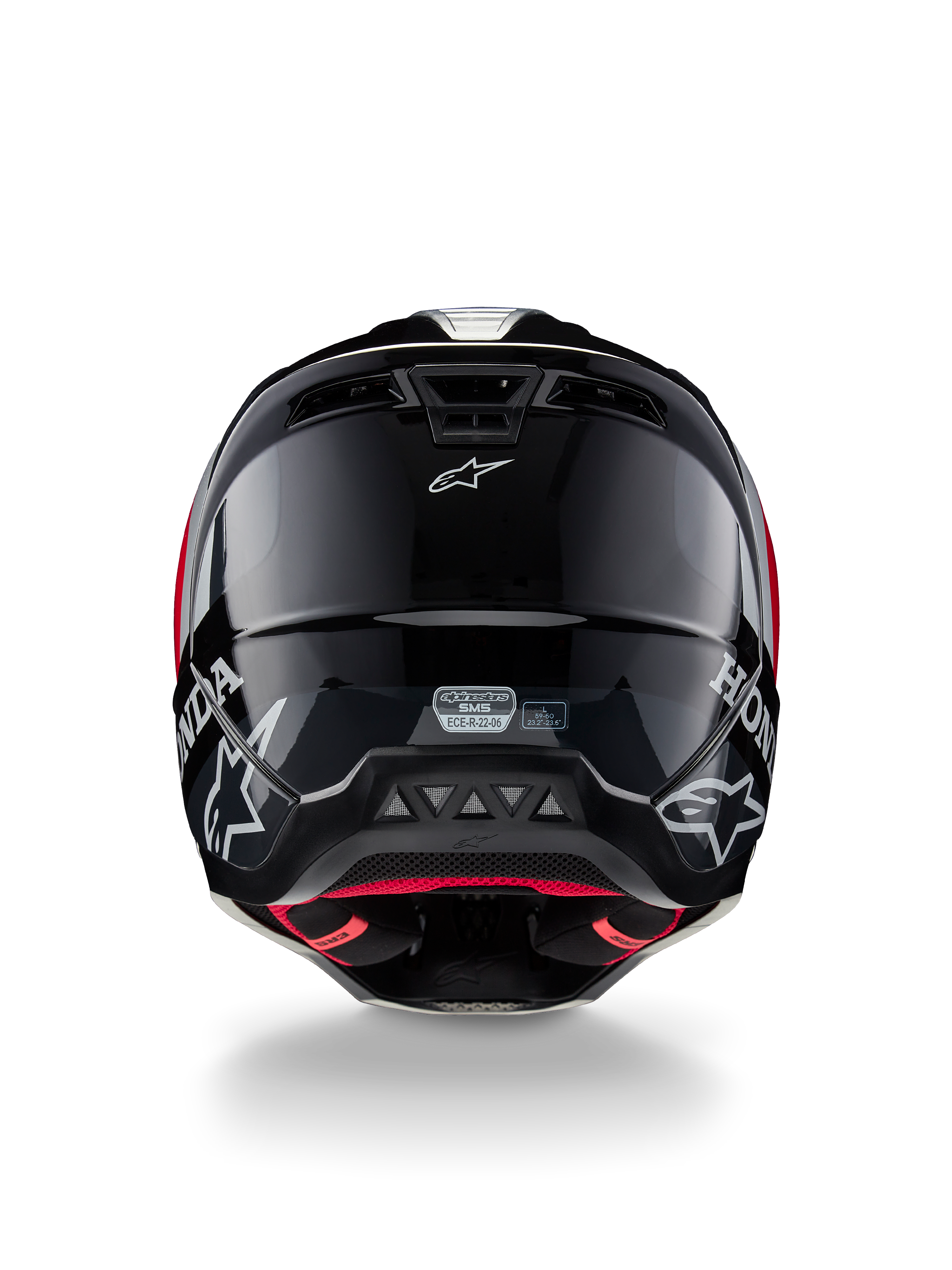 Casque Alpinestars Honda S-M5 ECE, casque de motocross, noir et rouge brillant, vue arrière montrant la coque noire brillante avec les logos Honda et Alpinestars blancs, la doublure intérieure rouge et l'étiquette de certification de sécurité ECE