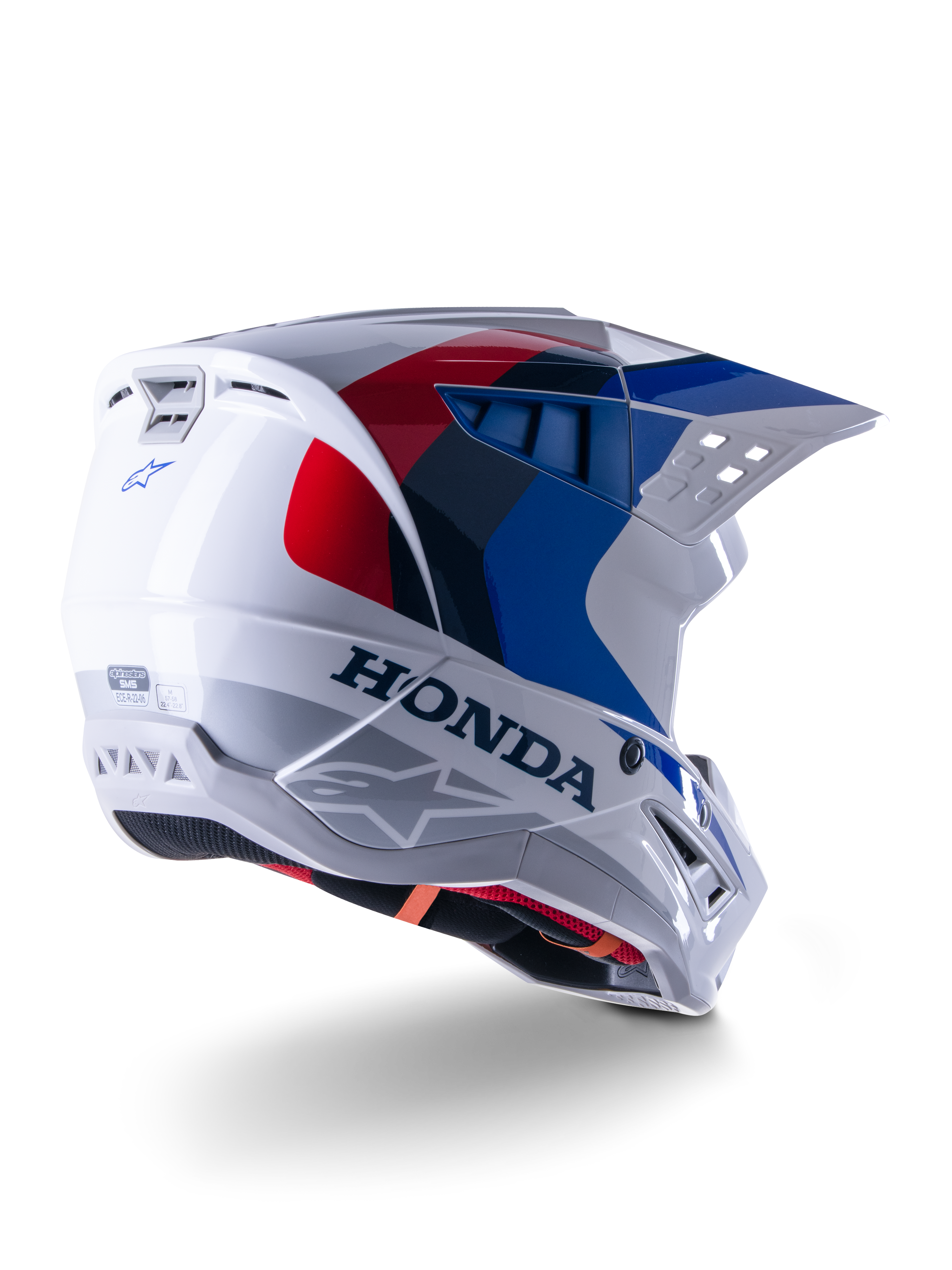 Alpinestars Honda S-M5 Helmet ECE, casque de motocross, blanc, bleu et rouge brillant, avec marquage Honda et logos Alpinestars, coque aérodynamique avec ports de ventilation intégrés et visière réglable, équipement de protection pour la course tout-terrain