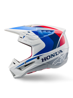 Casque Alpinestars Honda S-M5 ECE, blanc, bleu et rouge brillant, vue de profil, avec marquage Honda audacieux et logo étoile Alpinestars, design aérodynamique de motocross avec de multiples aérations et une visière proéminente, finition brillante