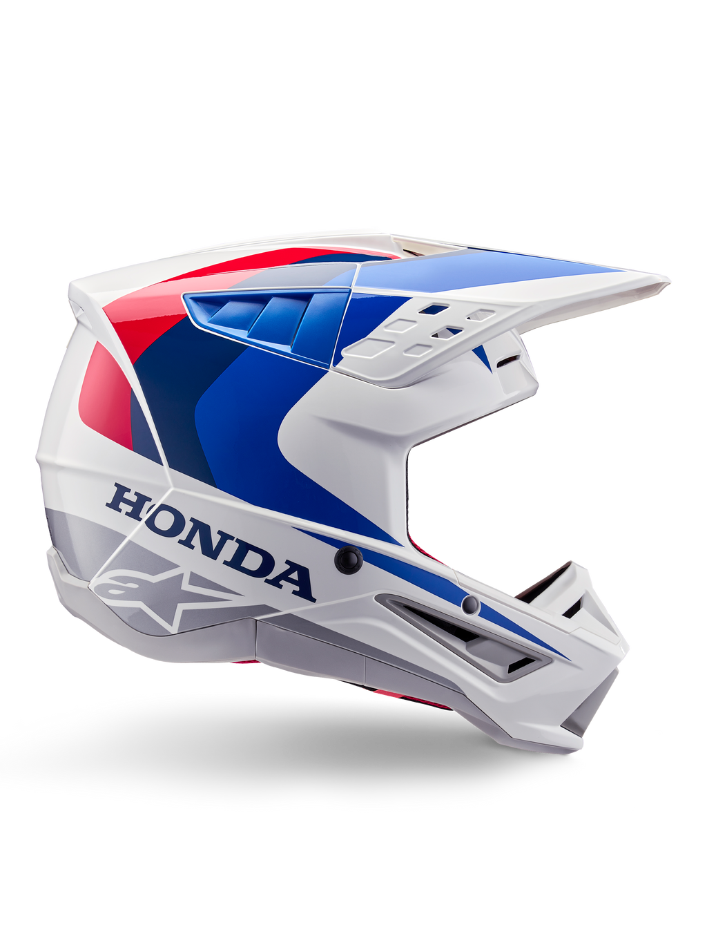 Alpinestars Honda S-M5 Helmet ECE, casque de motocross, blanc, bleu et rouge, vue de profil, design aérodynamique avec visière intégrée, nombreuses ouvertures de ventilation, finition brillante, marquage Honda et logo Alpinestars