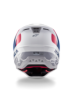 Casque Alpinestars Honda S-M5 ECE, casque de motocross, blanc, bleu et rouge brillant, vue arrière montrant les logos Honda et Alpinestars, coque profilée avec ports d'échappement de ventilation intégrés et étiquette de certification ECE.