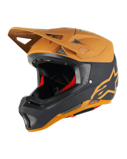 Alpinestars Missile Tech Racer Helmet, Full-Face MTB Helmet, Black and Dark Gold Matt, matte finish with gold star logo, red interior padding, silver mesh vents for airflow, angular visor, downhill mountain bike protection gear