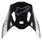 Visière Alpinestars Supertech M10 Carbon Meta2, visière de rechange noir et gris brillant, arborant un logo Alpinestars gris et des découpes de ventilation aérodynamiques, accessoire pour casque de motocross