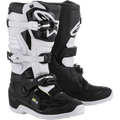 Bottes Alpinestars Stella Tech 3 pour femme, bottes de motocross et tout-terrain, noires et blanches, avec système de fermeture à trois boucles, plaques de tibia en TPU blanc avec logo Alpinestars, tige en microfibre noire avec empiècements blancs, semelles blanches, chaussures de protection haute performance pour les pilotes féminines