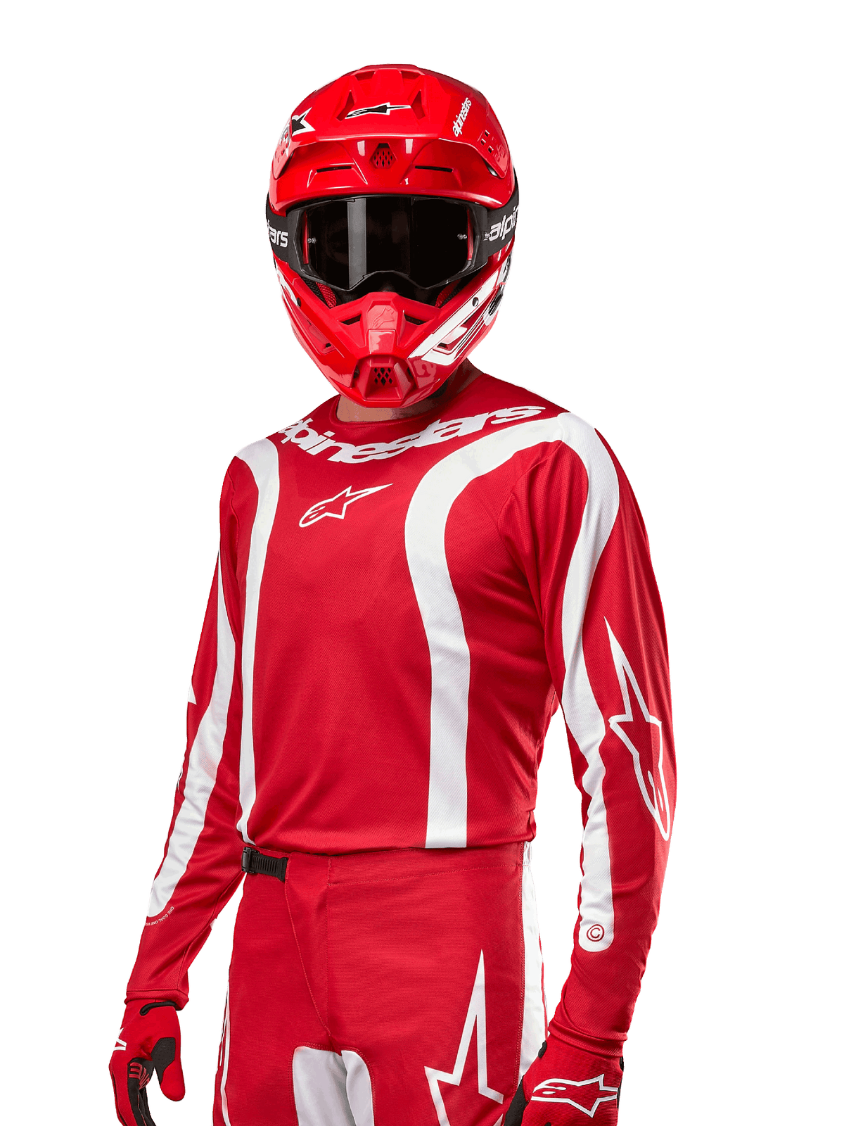 Maillot Fluid Lurv 2024, maillot de motocross, rouge Mars et blanc, porté avec casque et gants rouges assortis, design sportif audacieux avec rayures courbes blanches et logos Alpinestars