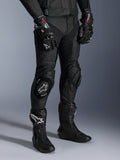 Missile V3 Leather Pants, Black Motorcycle Racing Pants, worn with matching GP Pro gloves and technical racing boots, premium leather construction with white logo knee sliders, professional racing aesthetic for track and road use