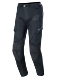 Alpinestars Boulder 3L GORE-TEX Pants - Short Length, Black Adventure Motorcycle Pants, featuring reinforced knee and thigh panels, multiple zippered pockets, magnetic belt buckle waist, and durable textured fabric for waterproof protection