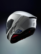 Alpinestars A-Connect Communication System installed on an Alpinestars S-R7 Motorcycle Helmet, White and Black, featuring Mesh 3.0 intercom and Bluetooth 5.3 control unit with active blue LED status light