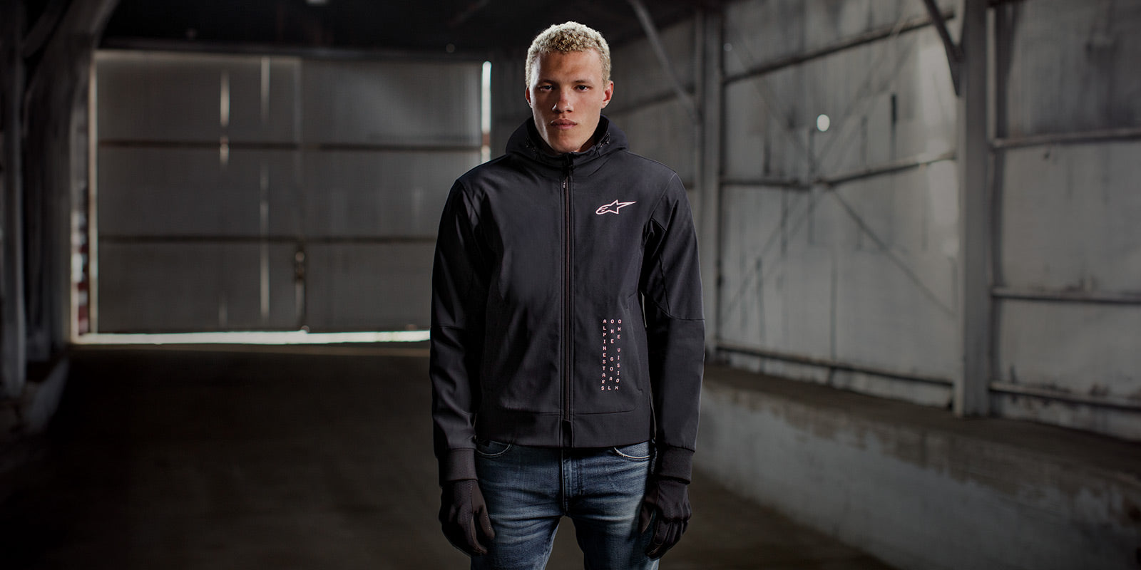 Alpinestars Radium Tech Hoodie, black men's urban motorcycle jacket, windproof shell with white chest logo.